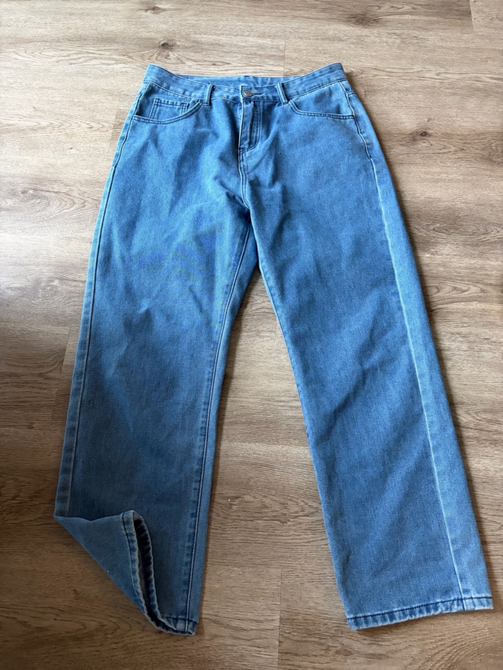 Medium wash open leg jeans